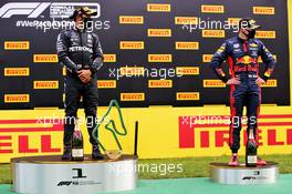 (L to R): Race winner Lewis Hamilton (GBR) Mercedes AMG F1 and third placed Max Verstappen (NLD) Red Bull Racing on the podium. 12.07.2020. Formula 1 World Championship, Rd 2, Steiermark Grand Prix, Spielberg, Austria, Race Day.