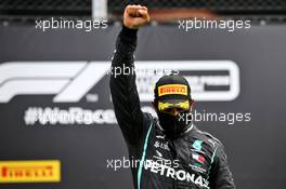 Race winner Lewis Hamilton (GBR) Mercedes AMG F1 - black power salute on the podium. 12.07.2020. Formula 1 World Championship, Rd 2, Steiermark Grand Prix, Spielberg, Austria, Race Day.