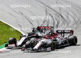 Kimi Raikkonen (FIN) Alfa Romeo Racing C39 and Romain Grosjean (FRA) Haas F1 Team VF-20 battle for position. 12.07.2020. Formula 1 World Championship, Rd 2, Steiermark Grand Prix, Spielberg, Austria, Race Day.