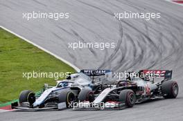 Nicholas Latifi (CDN) Williams Racing FW43 and Romain Grosjean (FRA) Haas F1 Team VF-20 battle for position. 12.07.2020. Formula 1 World Championship, Rd 2, Steiermark Grand Prix, Spielberg, Austria, Race Day.