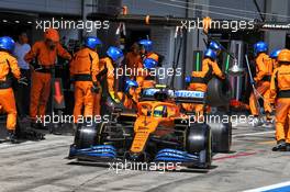 Lando Norris (GBR) McLaren MCL35 makes a pit stop. 12.07.2020. Formula 1 World Championship, Rd 2, Steiermark Grand Prix, Spielberg, Austria, Race Day.