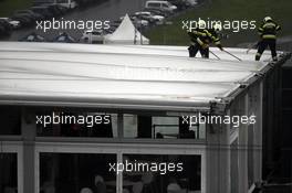 Firemen removing a water logged roof of a teams hospitality unit. 11.07.2020. Formula 1 World Championship, Rd 2, Steiermark Grand Prix, Spielberg, Austria, Qualifying Day.