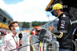 Esteban Ocon (FRA) Renault F1 Team with Jenson Button (GBR) Sky Sports F1 Presenter. 12.07.2020. Formula 1 World Championship, Rd 2, Steiermark Grand Prix, Spielberg, Austria, Race Day.