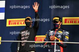 (L to R): race winner Lewis Hamilton (GBR) Mercedes AMG F1 celebrates on the podium with third placed Alexander Albon (THA) Red Bull Racing. 13.09.2020. Formula 1 World Championship, Rd 9, Tuscan Grand Prix, Mugello, Italy, Race Day.