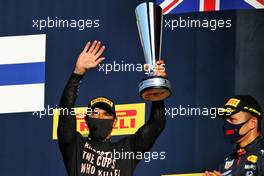 (L to R): Race winner Lewis Hamilton (GBR) Mercedes AMG F1 celebrates on the podium with third placed Alexander Albon (THA) Red Bull Racing. 13.09.2020. Formula 1 World Championship, Rd 9, Tuscan Grand Prix, Mugello, Italy, Race Day.