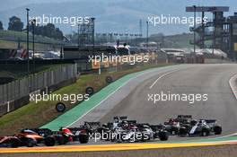 Daniil Kvyat (RUS) AlphaTauri AT01 and Max Verstappen (NLD) Red Bull Racing RB16 at the start of the race. 13.09.2020. Formula 1 World Championship, Rd 9, Tuscan Grand Prix, Mugello, Italy, Race Day.
