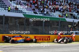Carlos Sainz Jr (ESP) McLaren MCL35 and Kevin Magnussen (DEN) Haas VF-20 crashed out of the race. 13.09.2020. Formula 1 World Championship, Rd 9, Tuscan Grand Prix, Mugello, Italy, Race Day.