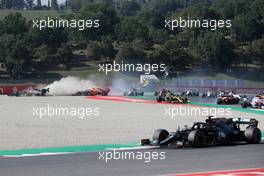 Max Verstappen (NLD) Red Bull Racing RB16 crashes out of the race with Romain Grosjean (FRA) Haas F1 Team VF-20 and Kimi Raikkonen (FIN) Alfa Romeo Racing C39. 13.09.2020. Formula 1 World Championship, Rd 9, Tuscan Grand Prix, Mugello, Italy, Race Day.