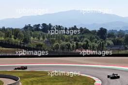 Lando Norris (GBR) McLaren MCL35 leads Daniel Ricciardo (AUS) Renault F1 Team RS20. 12.09.2020. Formula 1 World Championship, Rd 9, Tuscan Grand Prix, Mugello, Italy, Qualifying Day.