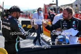 (L to R): Lewis Hamilton (GBR) Mercedes AMG F1 celebrates his pole position in qualifying parc ferme with third placed team mate Valtteri Bottas (FIN) Mercedes AMG F1. 12.09.2020. Formula 1 World Championship, Rd 9, Tuscan Grand Prix, Mugello, Italy, Qualifying Day.