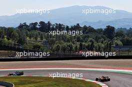 Daniil Kvyat (RUS) AlphaTauri AT01 leads Carlos Sainz Jr (ESP) McLaren MCL35. 12.09.2020. Formula 1 World Championship, Rd 9, Tuscan Grand Prix, Mugello, Italy, Qualifying Day.