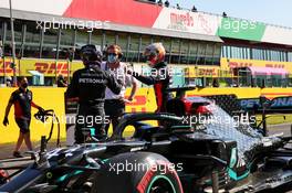 Lewis Hamilton (GBR) Mercedes AMG F1 celebrates his pole position in qualifying parc ferme with Max Verstappen (NLD) Red Bull Racing. 12.09.2020. Formula 1 World Championship, Rd 9, Tuscan Grand Prix, Mugello, Italy, Qualifying Day.
