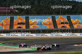 Max Verstappen (NLD) Red Bull Racing RB16 as Lance Stroll (CDN) Racing Point F1 Team RP20 runs wide. 13.11.2020 Formula 1 World Championship, Rd 14, Turkish Grand Prix, Istanbul, Turkey, Practice Day.