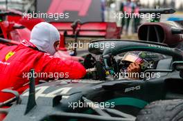 Race winner and World Champion Lewis Hamilton (GBR) Mercedes AMG F1 W11 celebrates in parc ferme with Sebastian Vettel (GER) Ferrari. 15.11.2020. Formula 1 World Championship, Rd 14, Turkish Grand Prix, Istanbul, Turkey, Race Day.