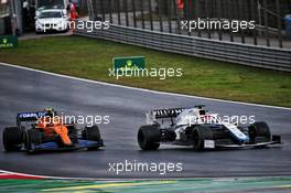 George Russell (GBR) Williams Racing FW43 and Lando Norris (GBR) McLaren MCL35. 15.11.2020. Formula 1 World Championship, Rd 14, Turkish Grand Prix, Istanbul, Turkey, Race Day.