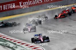 Lance Stroll (CDN) Racing Point F1 Team RP20 leads at the start of the race as Esteban Ocon (FRA) Renault F1 Team RS20 and Valtteri Bottas (FIN) Mercedes AMG F1 W11 spin off the circuit. 15.11.2020. Formula 1 World Championship, Rd 14, Turkish Grand Prix, Istanbul, Turkey, Race Day.