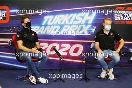 (L to R): Romain Grosjean (FRA) Haas F1 Team and team mate Kevin Magnussen (DEN) Haas F1 Team in the FIA Press Conference. 12.11.2020. Formula 1 World Championship, Rd 14, Turkish Grand Prix, Istanbul, Turkey, Preparation Day.