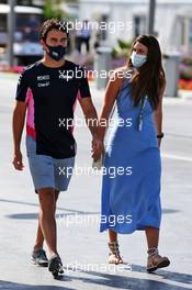 Sergio Perez (MEX) Racing Point F1 Team with his wife Carola Martinez (MEX). 11.12.2020. Formula 1 World Championship, Rd 17, Abu Dhabi Grand Prix, Yas Marina Circuit, Abu Dhabi, Practice Day.