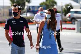 Sergio Perez (MEX) Racing Point F1 Team with his wife Carola Martinez (MEX). 11.12.2020. Formula 1 World Championship, Rd 17, Abu Dhabi Grand Prix, Yas Marina Circuit, Abu Dhabi, Practice Day.