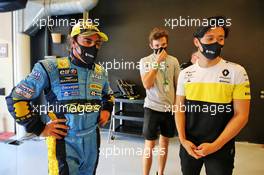 (L to R): Fernando Alonso (ESP) Renault F1 Team with Christian Lundgaard (DEN) Renault Sport Academy Driver and Guanyu Zhou (CHN) Renault F1 Team Test Driver. 11.12.2020. Formula 1 World Championship, Rd 17, Abu Dhabi Grand Prix, Yas Marina Circuit, Abu Dhabi, Practice Day.