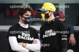 Lance Stroll (CDN) Racing Point F1 Team and Esteban Ocon (FRA) Renault F1 Team. 13.12.2020. Formula 1 World Championship, Rd 17, Abu Dhabi Grand Prix, Yas Marina Circuit, Abu Dhabi, Race Day.