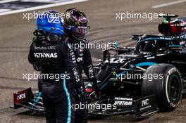 Valtteri Bottas (FIN) Mercedes AMG F1 and Lewis Hamilton (GBR) Mercedes AMG F1 in parc ferme. 13.12.2020. Formula 1 World Championship, Rd 17, Abu Dhabi Grand Prix, Yas Marina Circuit, Abu Dhabi, Race Day.