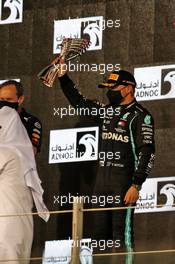 Valtteri Bottas (FIN) Mercedes AMG F1 celebrates his second position on the podium. 13.12.2020. Formula 1 World Championship, Rd 17, Abu Dhabi Grand Prix, Yas Marina Circuit, Abu Dhabi, Race Day.