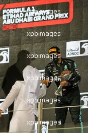 Lewis Hamilton (GBR) Mercedes AMG F1 celebrates his third position on the podium. 13.12.2020. Formula 1 World Championship, Rd 17, Abu Dhabi Grand Prix, Yas Marina Circuit, Abu Dhabi, Race Day.