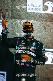 Lewis Hamilton (GBR) Mercedes AMG F1 celebrates his third position on the podium. 13.12.2020. Formula 1 World Championship, Rd 17, Abu Dhabi Grand Prix, Yas Marina Circuit, Abu Dhabi, Race Day.