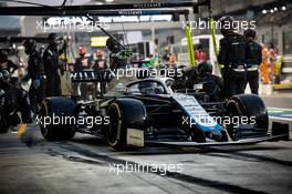 George Russell (GBR) Williams Racing FW43 makes a pit stop. 13.12.2020. Formula 1 World Championship, Rd 17, Abu Dhabi Grand Prix, Yas Marina Circuit, Abu Dhabi, Race Day.