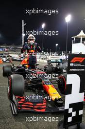 Max Verstappen (NLD) Red Bull Racing RB16 celebrates his pole position in qualifying parc ferme. 12.12.2020. Formula 1 World Championship, Rd 17, Abu Dhabi Grand Prix, Yas Marina Circuit, Abu Dhabi, Qualifying Day.