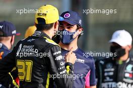 (L to R): Esteban Ocon (FRA) Renault F1 Team with Lance Stroll (CDN) Racing Point F1 Team. 13.12.2020. Formula 1 World Championship, Rd 17, Abu Dhabi Grand Prix, Yas Marina Circuit, Abu Dhabi, Race Day.