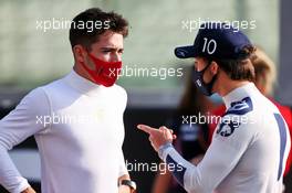 (L to R): Charles Leclerc (MON) Ferrari with Pierre Gasly (FRA) AlphaTauri. 13.12.2020. Formula 1 World Championship, Rd 17, Abu Dhabi Grand Prix, Yas Marina Circuit, Abu Dhabi, Race Day.