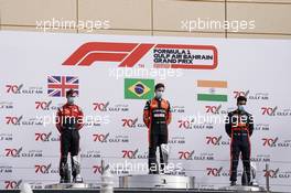 Podium: (L to R) Callum Ilott (GBR) Uni-Virtuosi Racing, second place; Felipe Drugovich (BRA) MP Motorsport, race winner; Jehan Daruvala (IND) Carlin, third place. 28.11.2020. FIA Formula 2 Championship, Rd 11, Sakhir, Bahrain, Saturday.