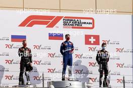 Podium: (L to R) Nikita Mazepin (RUS) Hitech, second place; Robert Shwartzman (RUS) PREMA Racing, Race winner; Louis Deletraz (SUI) Charouz Racing System, third place. 29.11.2020. FIA Formula 2 Championship, Rd 11, Sakhir, Bahrain, Sunday.
