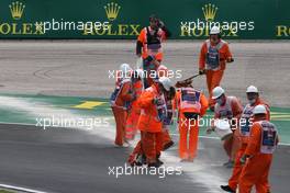 Marshalls clearing up oil on the track.  18.07.2020. FIA Formula 3 Championship, Rd 3, Budapest, Hungary, Saturday.
