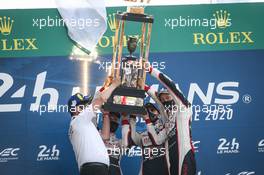 (L to R): Race winners Kazuki Nakajima (JPN), Sebastien Buemi (SUI), and Brendon Hartley (NZL) #08 Toyota Gazoo Racing, celebrate on the podium. 20.09.2020. FIA World Endurance Championship, Le Mans 24 Hours, Race, Le Mans, France. Sunday.