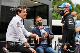 (L to R): Toto Wolff (GER) Mercedes AMG F1 Shareholder and Executive Director with Guanyu Zhou (CHN) Alpine F1 Team Test Driver. 02.07.2021. Formula 1 World Championship, Rd 9, Austrian Grand Prix, Spielberg, Austria, Practice Day.