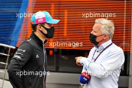(L to R): Guanyu Zhou (CHN) Alpine F1 Team Test Driver with Johnny Herbert (GBR) Sky Sports F1 Presenter. 02.07.2021. Formula 1 World Championship, Rd 9, Austrian Grand Prix, Spielberg, Austria, Practice Day.