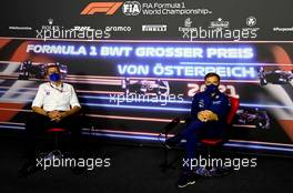 (L to R): Guenther Steiner (ITA) Haas F1 Team Prinicipal and Jost Capito (GER) Williams Racing Chief Executive Officer in the FIA Press Conference. 02.07.2021. Formula 1 World Championship, Rd 9, Austrian Grand Prix, Spielberg, Austria, Practice Day.