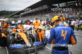 Lando Norris (GBR) McLaren MCL35M on the grid. 04.07.2021. Formula 1 World Championship, Rd 9, Austrian Grand Prix, Spielberg, Austria, Race Day.