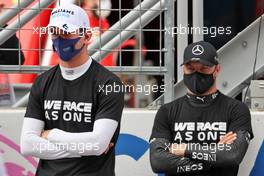 (L to R): Nicholas Latifi (CDN) Williams Racing and Valtteri Bottas (FIN) Mercedes AMG F1 on the grid. 04.07.2021. Formula 1 World Championship, Rd 9, Austrian Grand Prix, Spielberg, Austria, Race Day.