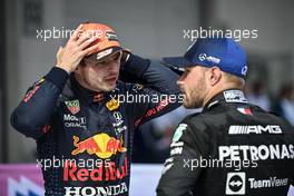 (L to R): Race winner Max Verstappen (NLD) Red Bull Racing with second placed Valtteri Bottas (FIN) Mercedes AMG F1 in parc ferme. 04.07.2021. Formula 1 World Championship, Rd 9, Austrian Grand Prix, Spielberg, Austria, Race Day.