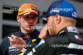 (L to R): race winner Max Verstappen (NLD) Red Bull Racing with second placed Valtteri Bottas (FIN) Mercedes AMG F1 in parc ferme. 04.07.2021. Formula 1 World Championship, Rd 9, Austrian Grand Prix, Spielberg, Austria, Race Day.