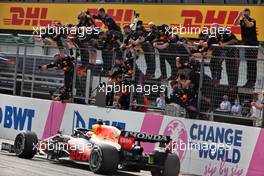 Race winner Max Verstappen (NLD) Red Bull Racing RB16B celebrates as he passes the team at the end of the race. 04.07.2021. Formula 1 World Championship, Rd 9, Austrian Grand Prix, Spielberg, Austria, Race Day.
