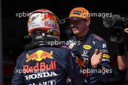 (L to R): Sergio Perez (MEX) Red Bull Racing with pole sitter and team mate Max Verstappen (NLD) Red Bull Racing in qualifying parc ferme. 03.07.2021. Formula 1 World Championship, Rd 9, Austrian Grand Prix, Spielberg, Austria, Qualifying Day.