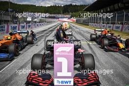 Pole sitter Max Verstappen (NLD) Red Bull Racing RB16B in qualifying parc ferme. 03.07.2021. Formula 1 World Championship, Rd 9, Austrian Grand Prix, Spielberg, Austria, Qualifying Day.