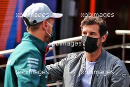 (L to R): Sebastian Vettel (GER) Aston Martin F1 Team with Mark Webber (AUS) Channel 4 Presenter. 01.07.2021. Formula 1 World Championship, Rd 9, Austrian Grand Prix, Spielberg, Austria, Preparation Day.