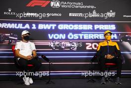 (L to R): Valtteri Bottas (FIN) Mercedes AMG F1 and Lando Norris (GBR) McLaren in the FIA Press Conference. 01.07.2021. Formula 1 World Championship, Rd 9, Austrian Grand Prix, Spielberg, Austria, Preparation Day.