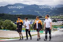 Lando Norris (GBR) McLaren walks the circuit with the team. 01.07.2021. Formula 1 World Championship, Rd 9, Austrian Grand Prix, Spielberg, Austria, Preparation Day.